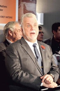 Premier Couillard speaking at an assembly of regional Chiefs in Montreal